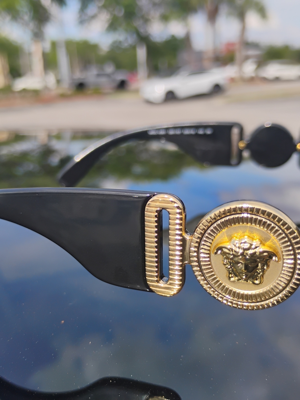 Versace Black Sunglasses with Gold Medallion Detail